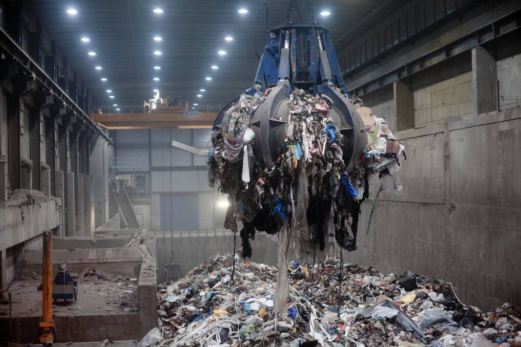 Trash piled nine metres high awaits incineration inside the waste-to-energy agency plant in the Norwegian capital Oslo,  where roughly half the city and most of its schools are heated by burning garbage. Photo: New York Times