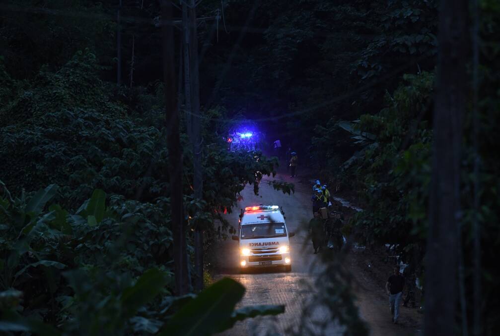 An ambulance carries the 6th person rescued from Tham Luang cave.  Photo: Kate Geraghty 