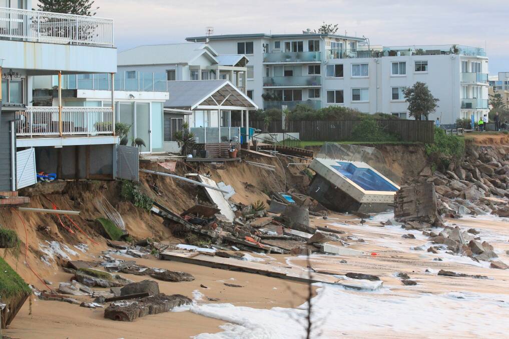 A big storm caused houses at Collaroy to collapse into the ocean in 2016. Photo: Peter Rae