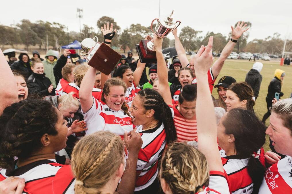The Tuggeranong Viqueens celebrate their first grand final win since 2010. Photo: Jamila Toderas
