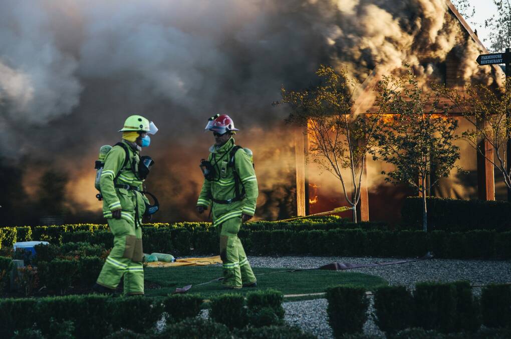 Emergency services work to extinguish the fire at Pialligo Farmhouse Restaurant. Photo: Rohan Thomson