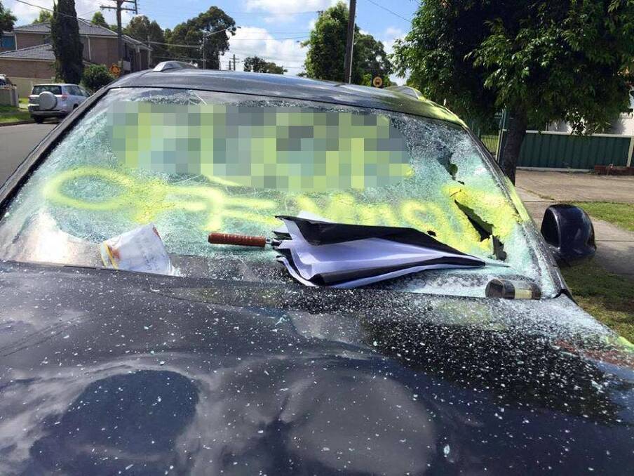As well as graffiti, the windscreen was smashed in. Photo: Islamophobia Register Australia's Facebook page