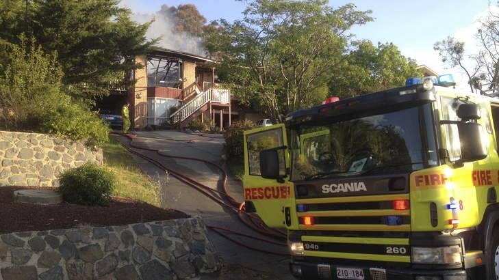 Firefighters on the scene at Calwell. Photo: Graham Tidy