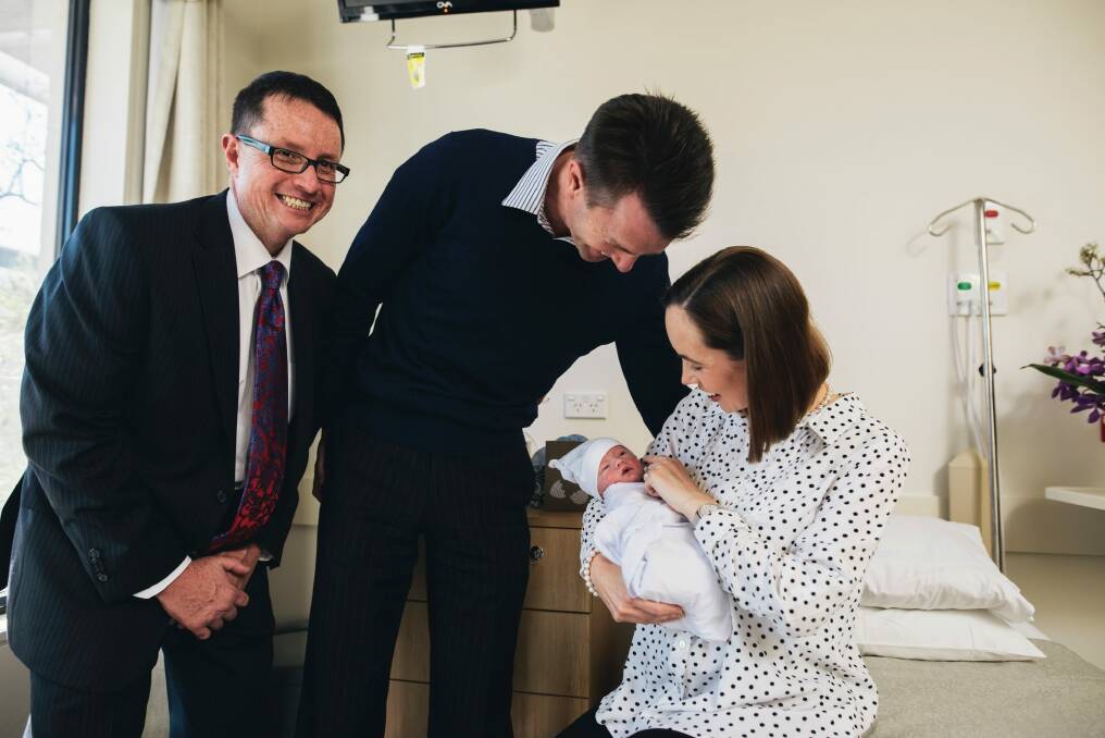 Pregnant Pause advocator Professor Steve Robson with new parents Andrew and Karina with their son Nicholas at John James Hospital. Photo: Rohan Thomson