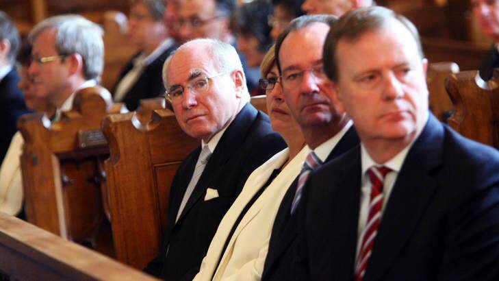 Peter Costello, Mark Vaile, John Howard and, in the background, Kevin Rudd, at the Annual Service of Prayer and Worship to open the 2007 Parliamentary Year. Photo: Louie Douvis