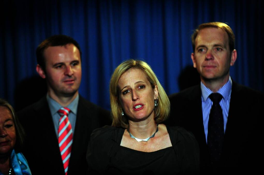 Changing of the guard: Andrew Barr, left, will take over as ACT chief minister when Katy Gallagher, centre, resigns and Simon Corbell, right, will become the new deputy. Photo: Karleen Minney