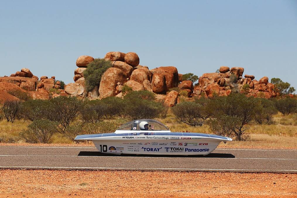 A World Solar Challenge electric vehicle whispers through the Northern Territory.
