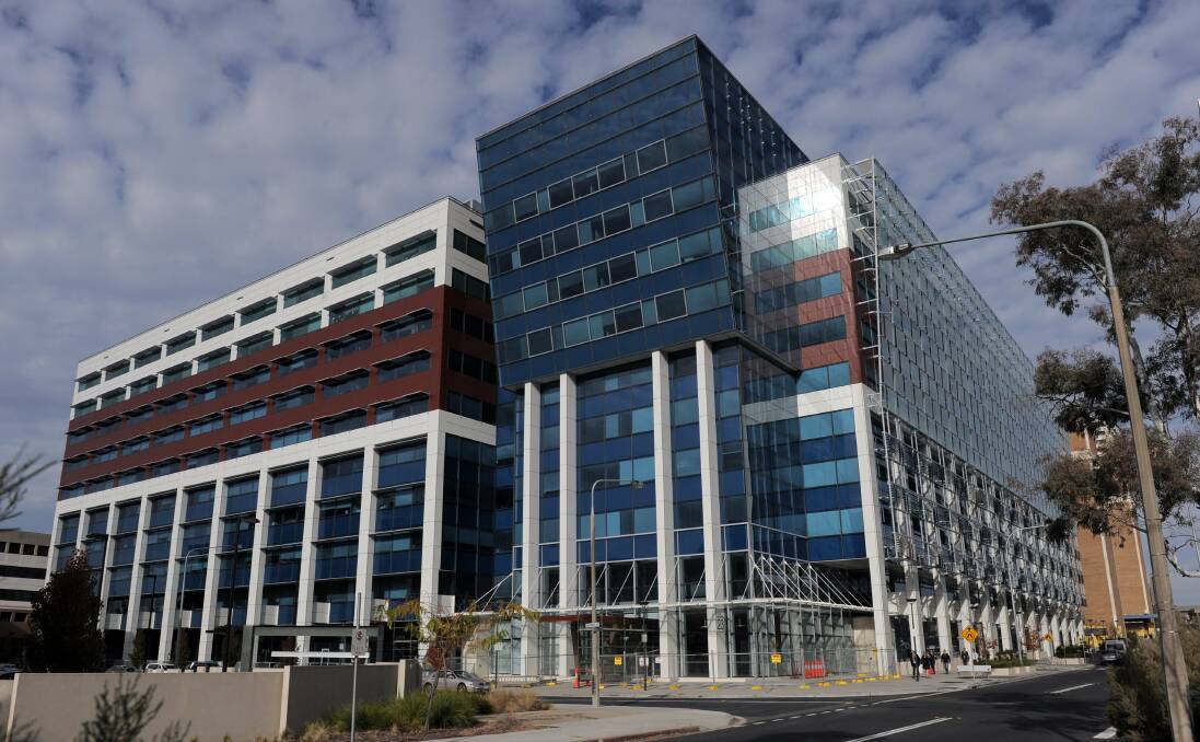 The Department of Health is staying in the Sirius building, in Woden, for another 16 years. Photo: Graham Tidy
