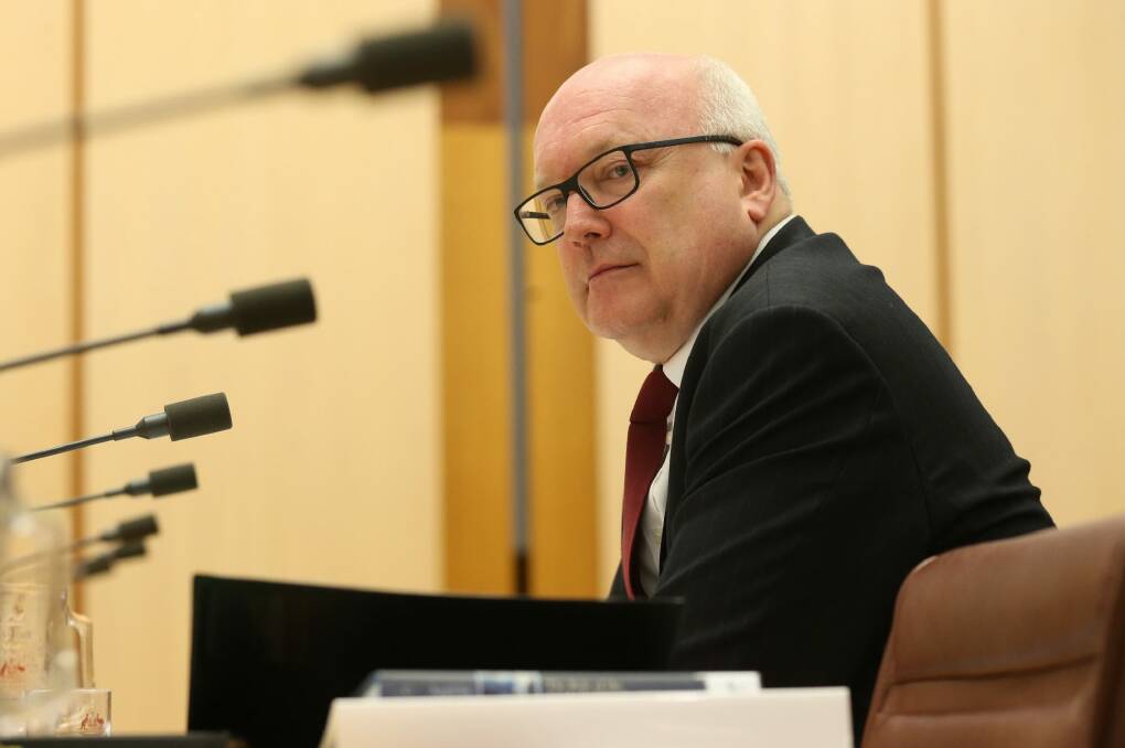 Attorney-General George Brandis's position on funding means thousands of Australians will go without access to justice. Photo: Andrew Meares