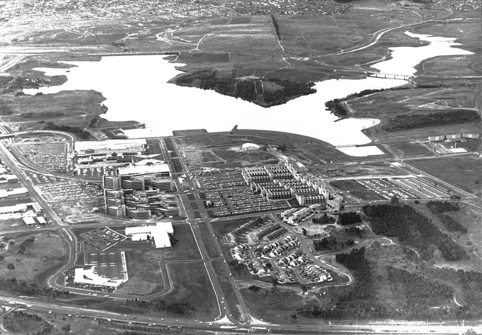 An aerial view of the Belconnen town centre, with Lake Ginninderra in the background, in February 1982. Photo: Canberra Times archives