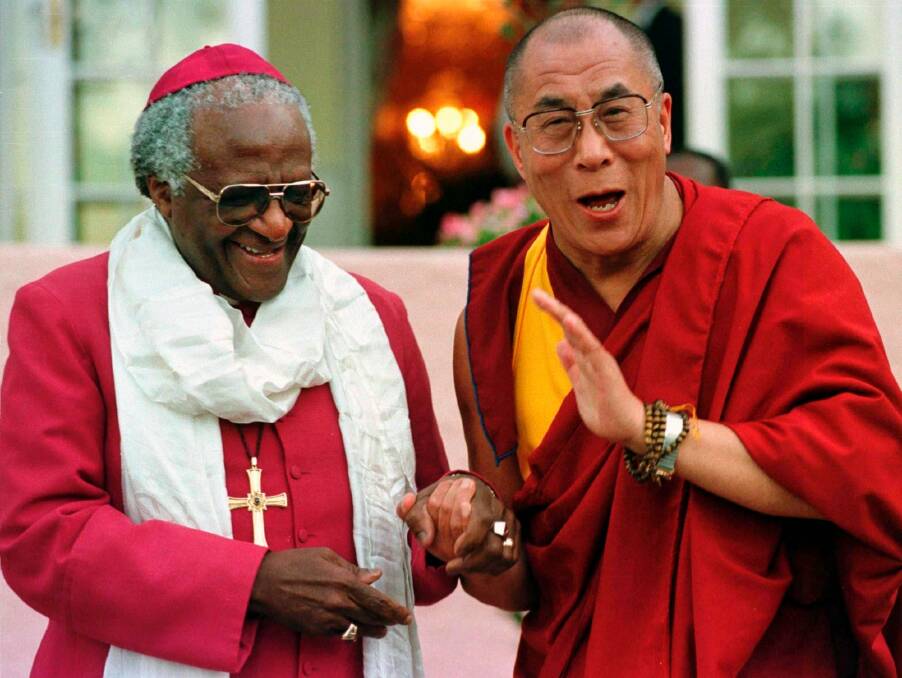 Archbishop Desmond Tutu and the Dalai Lama meet the media in Cape Town in 1996.
