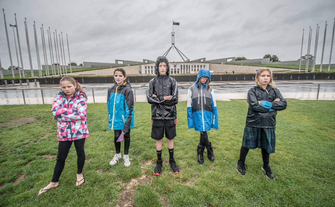 Students protest outside Parliament House.  Photo: Karleen Minney