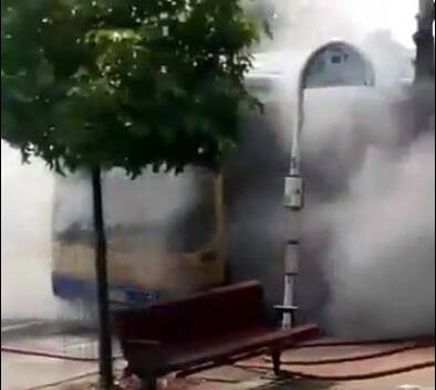 Smoke billowing from the bus at Moorooka. Photo: Twitter/ABC