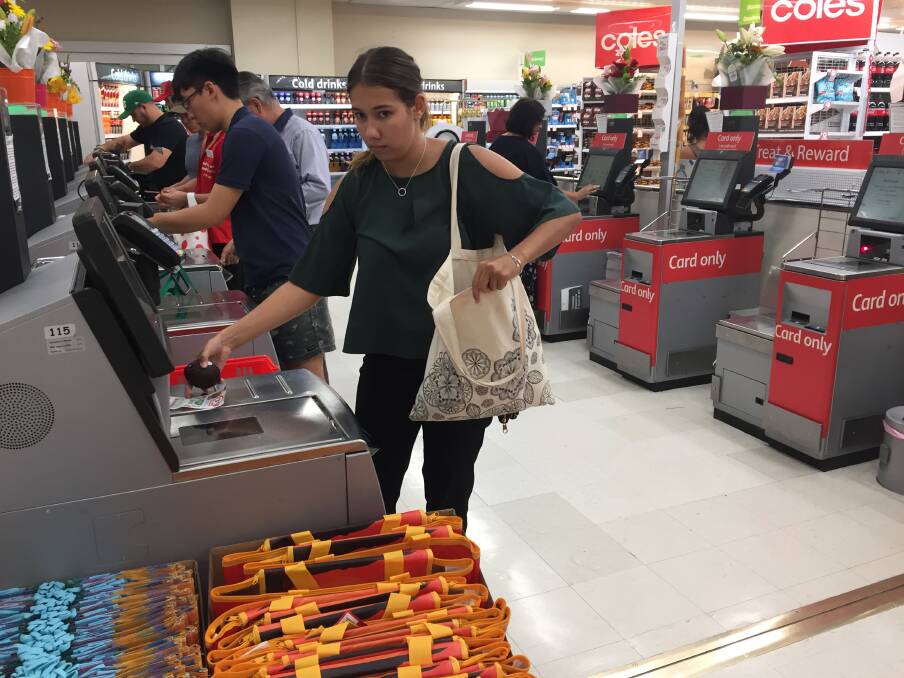 Shoppers are now comfortable bringing their own bags to supermarkets six months after the plastic bag ban was introduced in Queensland on July 1. Photo: Toiny Moore