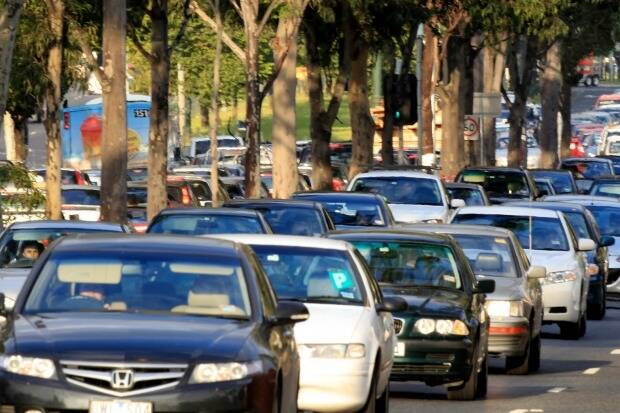 Melbourne motorists spend up to three days a year battling traffic jams. Photo: Paul Rovere