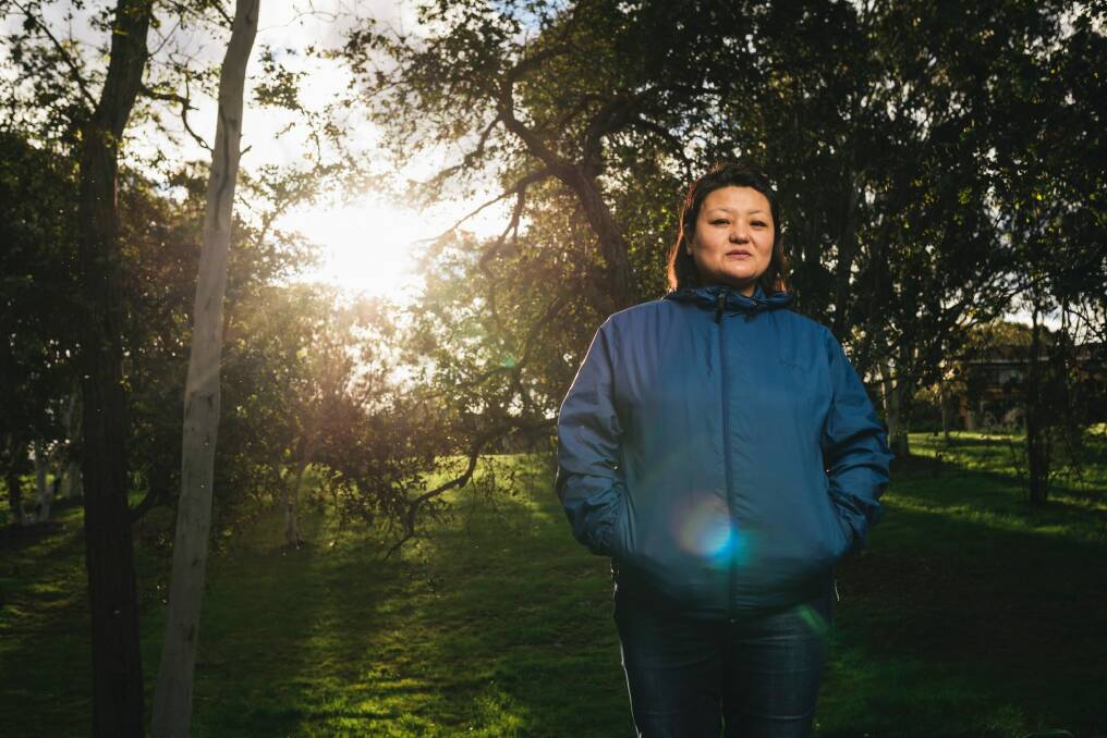 Peyma Choden paid her own way for a masters degree in Canberra but she and her husband struggled to meet the costs for her daughter to attend a public school. Photo: Rohan Thomson