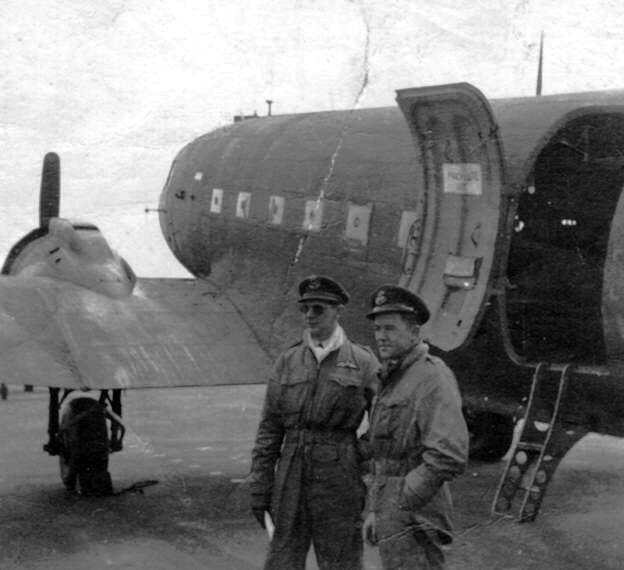 David Evans, left, with RAAF navigator, Flight Lieutenant Kevin Carrick, waiting as their plane is unloaded in Berlin during the airlift in 1948.