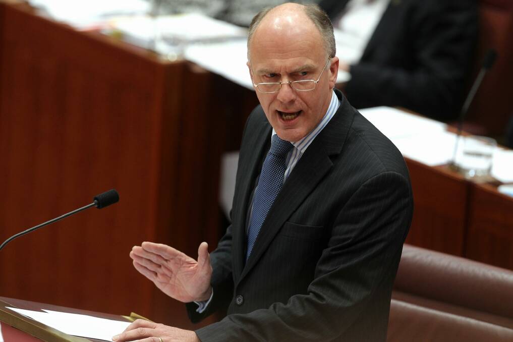 Public Service Minister Eric Abetz is continuing his push to keep public servants' pay increases low or non-existent.  Photo: Alex Ellinghausen