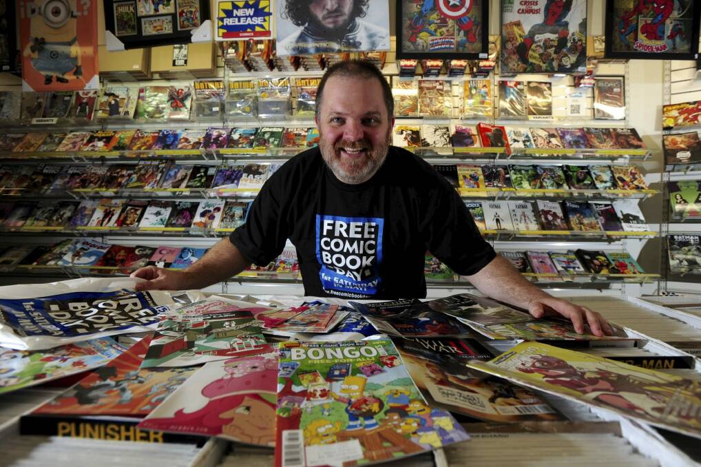 Co-owner of Impact Comics in Garema Place, Civic, Mal Briggs, is gearing up for a big Comic Book Day and will give comics to the Canberra Hospital children's ward.  Photo: Graham Tidy