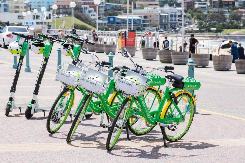 Lime launched with electric bikes in November. Scooters will next be trialed in Manly. Photo: Paul Lovelace