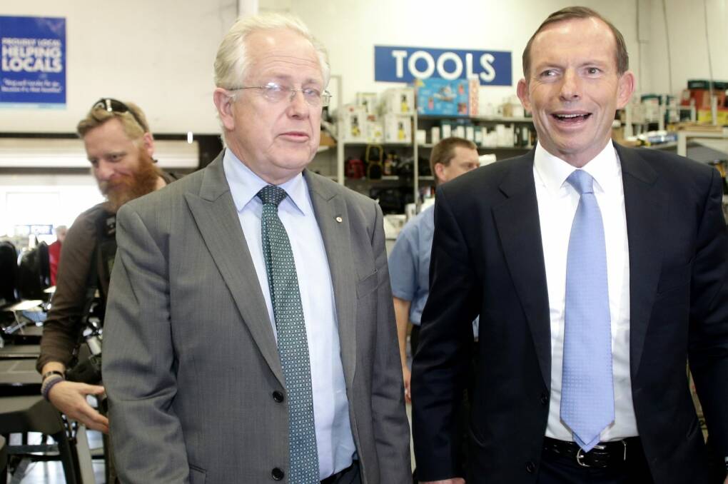Tony Abbott tours a hardware store with Liberal candidate Dr Michael Feneley. Photo: Alex Ellinghausen