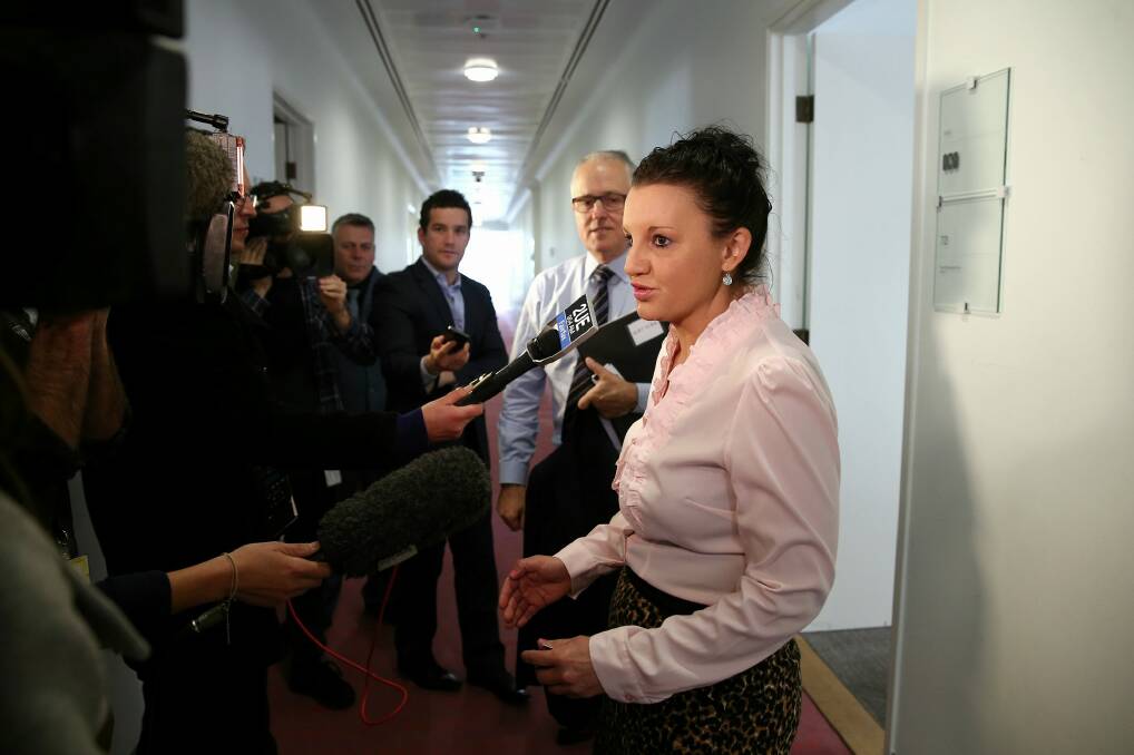 PUP senator Jacqui Lambie, pictured with Malcolm Turnbull, has praised the new Prime Minister. Photo: Alex Ellinghausen