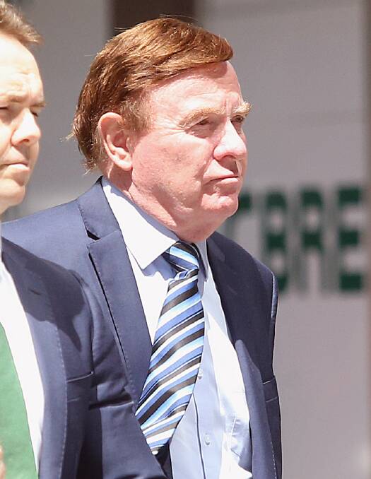 Carl Wulff arrives at the Brisbane District and Supreme Court in December. Photo: Jono Searle - AAP