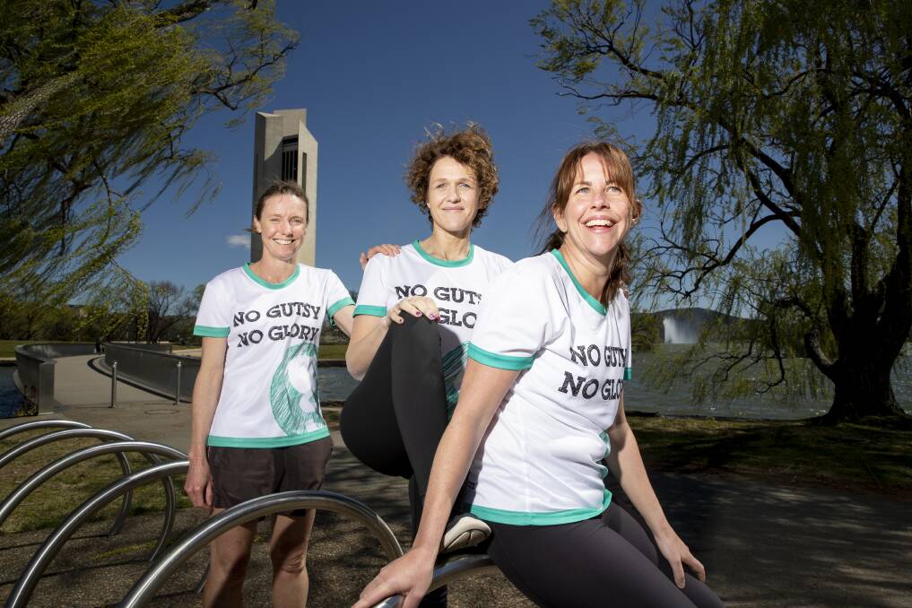 Jen Ticehurst, left, Sarah McGoram, and Maggie Almond are running in the Canberra Times fun run to raise money for gastrointestinal cancer. Photo: Sitthixay Ditthavong