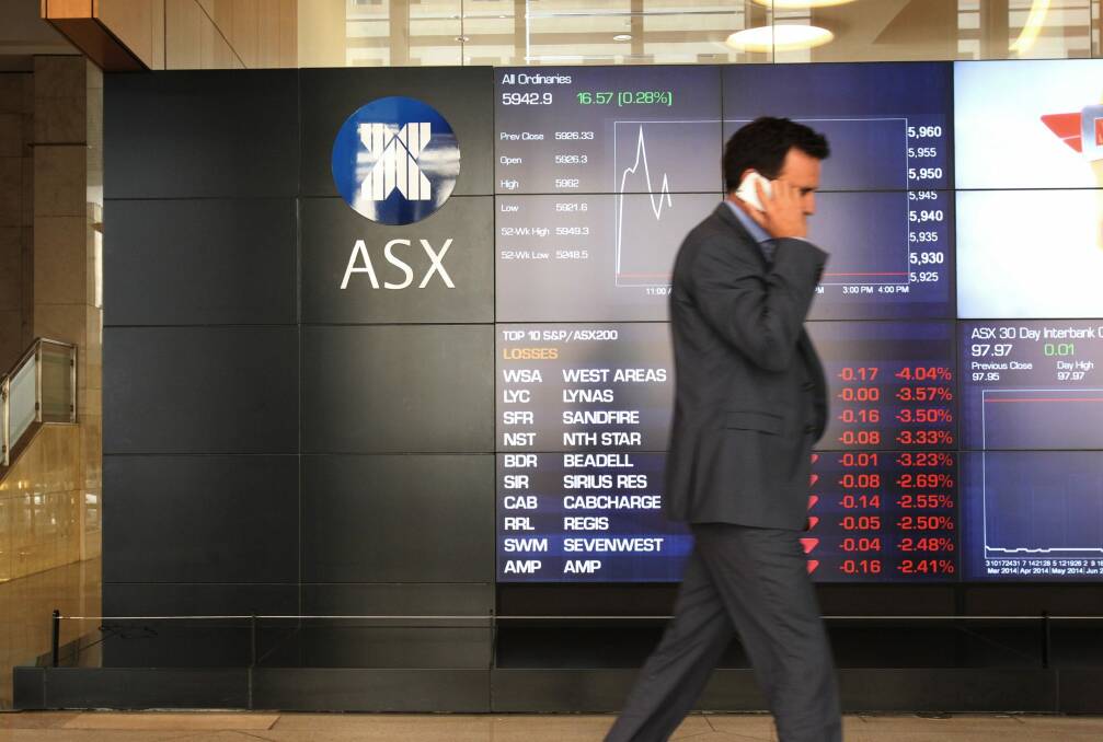 The S&P/ASX200 finished the day on its lows, 0.4 per cent down at 5295.6. Photo: Louise Kennerley