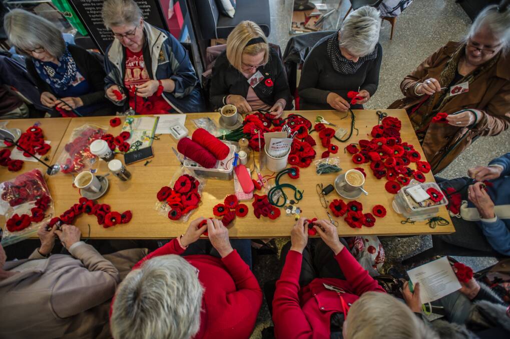 Volunteers from Canberra have made more than 5000 poppies for the display at the Australian War Memorial. Photo: Karleen Minney