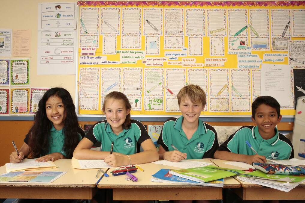 From left, Palmerston Primary School year 6 students Tharaphi Naing, Claire Warner, Will Rice and Abdullah Islam.  Photo: Jeffrey Chan