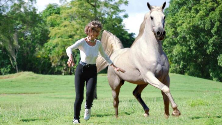 Prancercise creator Joanna Rohrback doing what she loves, her "spooky and goofy and weird and wacky” '80s workout inspired by horses. Photo: Prancercise.com