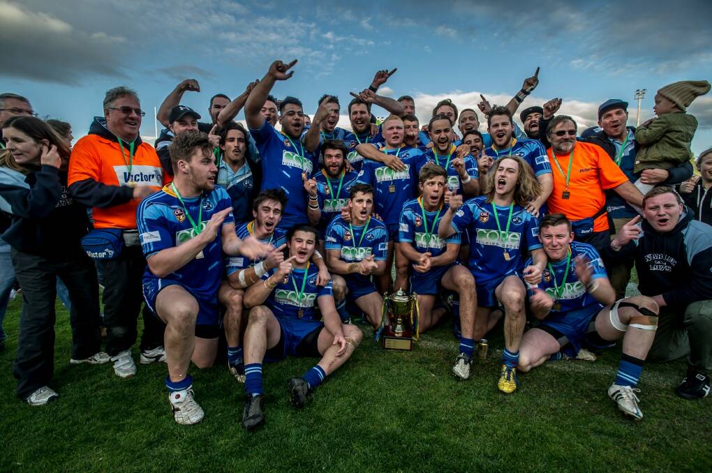West Belconnen Warriors players celebrate their upset Canberra Raiders Cup grand final triumph. Photo: Karleen Minney
