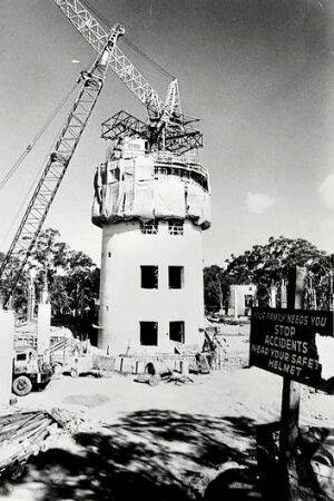 The Black Mountain tower starts to rise above the treeline in 1974. Photo: Supplied