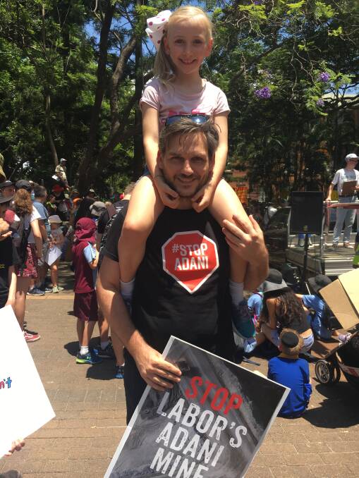 Greens MP Michael Berkman attended the protest with his daughter Bonnie.  Photo: Lydia Lynch