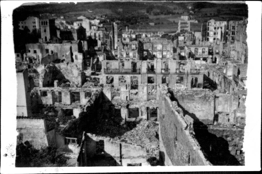 Guernica in ruins in 1937, after it became the world's first civilian population centre to be carpet bombed. 