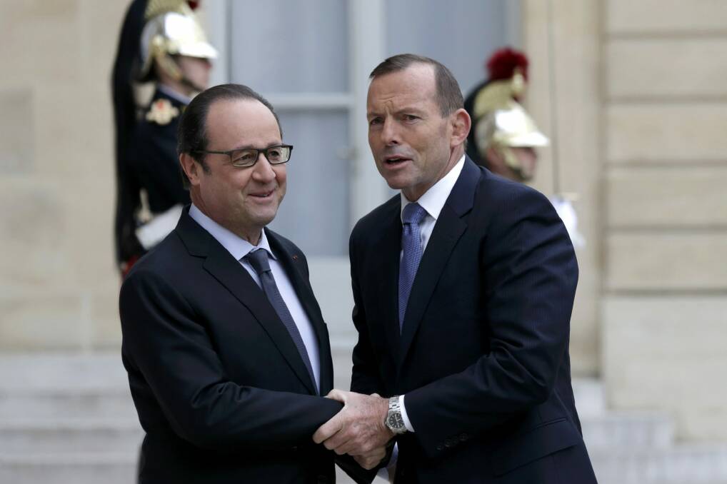 Prime Minister Tony Abbott met with French President Francois Hollande during his visit to Paris last month.  Photo: Reuters