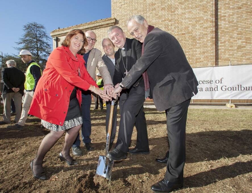 At the groundbreaking ceremony at Manuka, from left, archdiocesan financial administrator Helen Delahunty, architect Rodney Moss, project manager David Colbertaldo, Archbishop Christopher Prowse and Monsignor John Wood.  Photo: Loui Seselja
