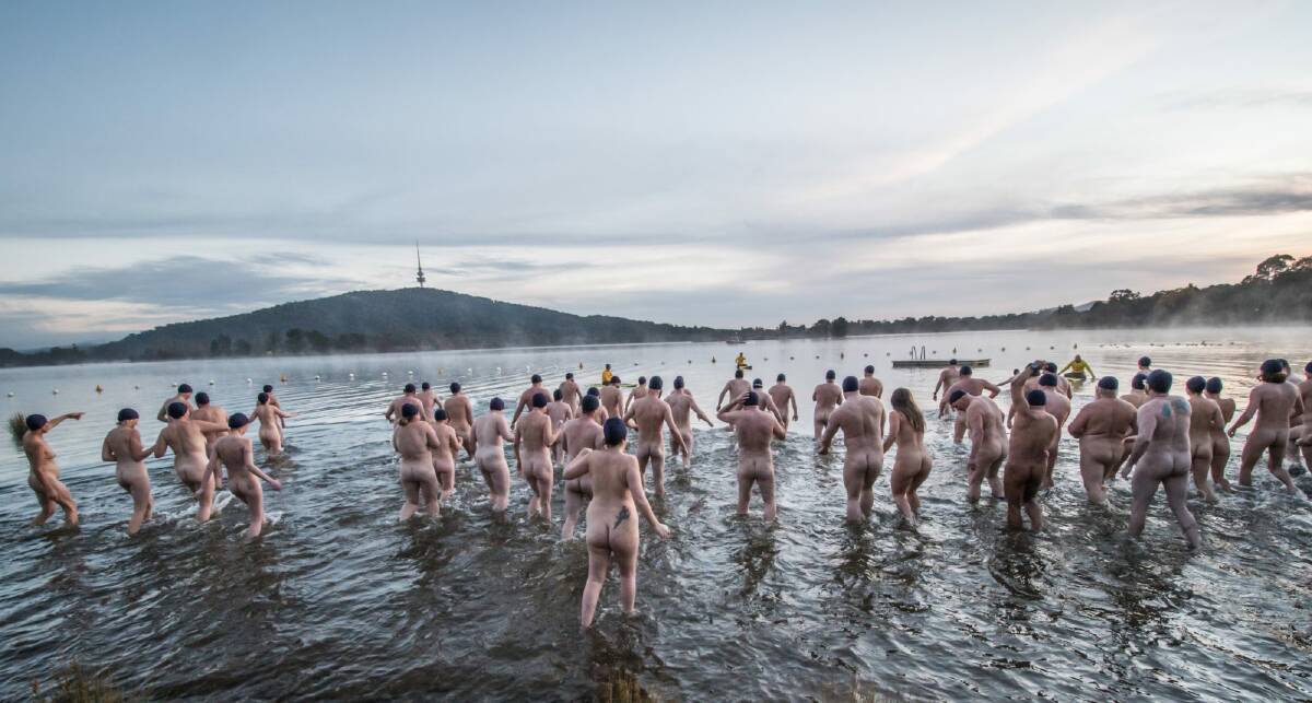 Participants in Canberra's 2018 Winter solstice nude charity swim raised money for local charities Lifeline Canberra and Love your sister by taking a plunge in Lake Burley Griffin on a -3 degree morning.  Photo: Karleen Minney
