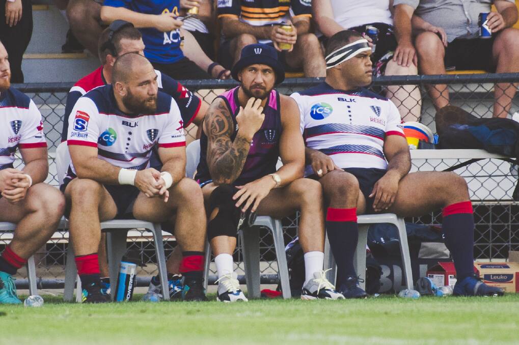 Star recruit: Quade Cooper watches on from the bench in the pre-season. Photo: Jamila Toderas