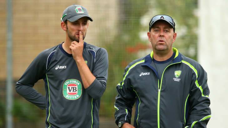 Off-spinner Nathan Lyon with Australian coach Darren Lehmann. Photo: Getty Images