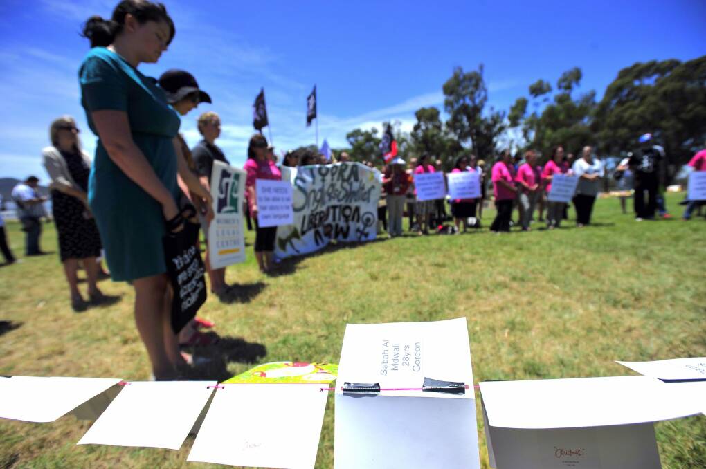 Christmas cards bore the names, ages and suburbs of 78 women who died due to violence in Australia this year.  Photo: Elesa Kurtz