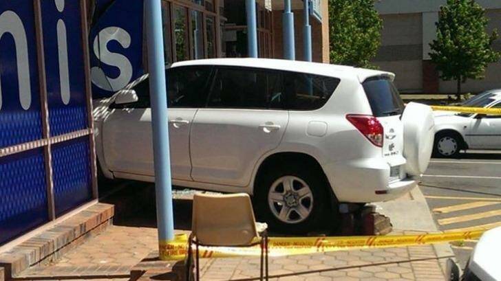 A car crashed into the Vinnies store in Greenway on Monday morning.  Photo: Ali Mountifield
