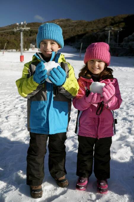 Issabella and Christian and other snow-goers at Thredbo made the most of man-made snow over the weekend.