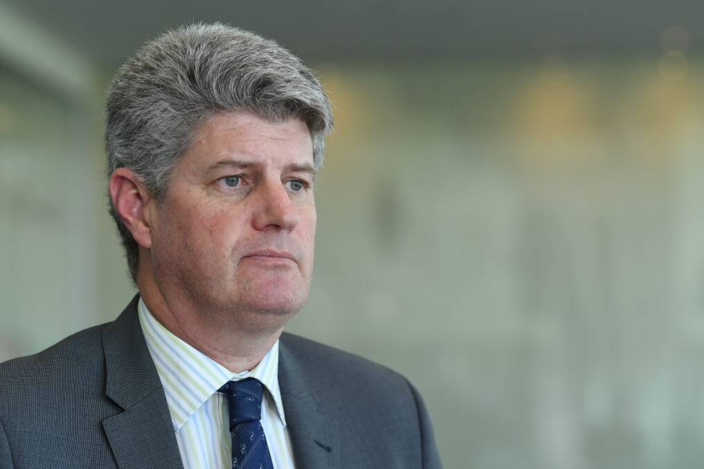 Local Government Minister Stirling Hinchliffe will decide Ipswich's fate as early as next week. Photo: AAP Image/ Dave Hunt