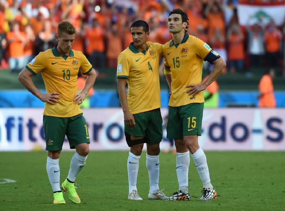 Oliver Bozanic,Tim Cahill and  Mile Jedinak ... not enough to draw a crowd for the Spanish Club.  Photo: AFP