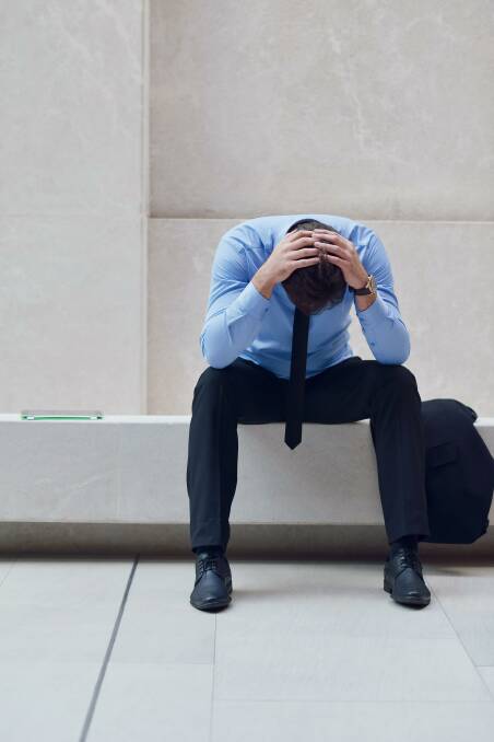 About one in three Queensland public servants feel overloaded with work. Photo: Alamy