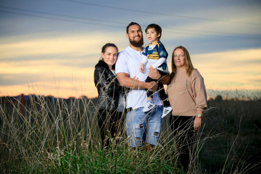 Brumbies flanker Jordan Smiler, with wife Stacey, three-year-old son Keanu, and mother-in-law Michelle.  Photo: Sitthixay Ditthavong
