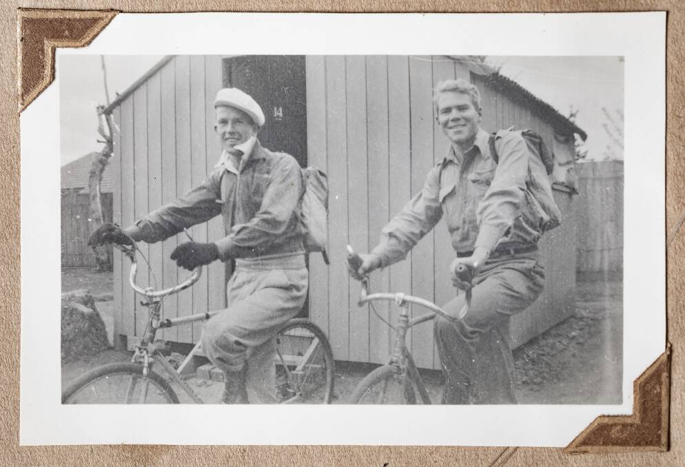 Richard 'Dick' Woods and Alan McArthur riding from Canberra to Batemans Bay via the Clyde Mountain in 1943. Photo: Supplied