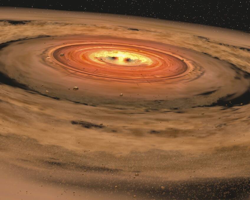 An artist’s depiction of a dusty "circumstellar" disc orbiting a young red dwarf star. Photo: Supplied
